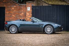 Image result for Midnight Blue 2010 Aston Martin