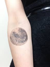 These moon tattoos are filled with intricate and ornate designs that take them beyond basic. Realistic Moon Tattoo
