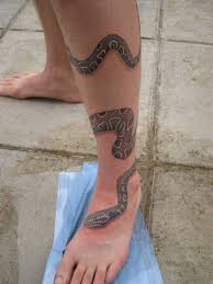 More than 60.000 free tattoos. 61 Wonderful Snake Tattoos On Leg