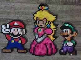 Articles Similaires A Super Mario Bros Mario Peach Luigi Sprites Perler Beads Sur Etsy Perler Bead Mario Perler Bead Art Perler Beads