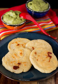 Pupusas are an el salvador treat, consisting of thick corn tortillas stuffed with cheese, beans, and/or marian blazes is a freelance writer and recipe developer with a passion for south american food. Cheese Pupusas W Tomatillo Avocado Salsa Table For Two By Julie Chiou