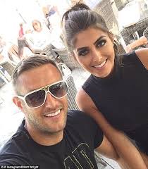 Elliott Wright's fianceé Sadie Stuart flashes her bra as they enjoy a date  night