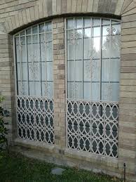 Can be locked with a padlock or nut and bolt (not included). Decorative Ironbars Burglar Bars In Dallas Window Guards Security Bars