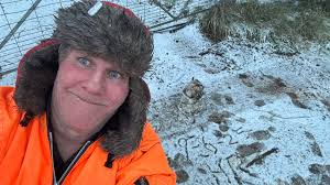 The king enjoys winter activities near the castle moat