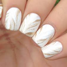 Don't be in a rush, you could mess the white tips. Better Than Basic White Nail Designs More