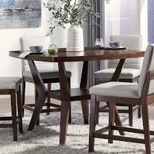 An unconventional choice that is gaining popularity, counter height dining room sets make mealtime fun and relaxed. Mila Counter Height Table W Lazy Susan By Standard Furniture Furniturepick