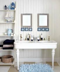 Our favorite features in this beach house bathroom by my younique designs situated in san antonio, texas are the colorful wood tile backsplash and the giant crab wall hanging. Beach Decor Bathroom Ideas Design Corral