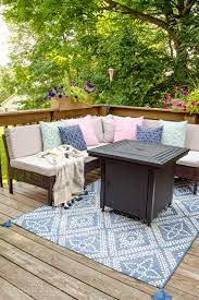 Set up patio lights to give your space that magical glow at night. Small Deck Decorating Ideas Our Deck Tour Unoriginal Mom
