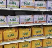 Warsaw, Poland - July 15, 2025: Baby Diapers Stacked on ...