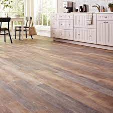 This flooring can be made to look like different wood species, or to resemble ceramic tile. Basement Vinyl Flooring Flooring The Home Depot