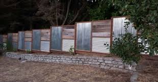 I'm curious as to how plausible it would be to do a steel paneled fence. Rustic Corrugated Iron Fence Novocom Top