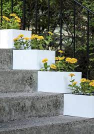 A Simple Vertical Garden How To Diy Stair Step Planters Vertical Garden Simple Landscape Design Stair Planter
