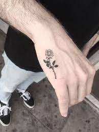 Roses are frequently related to girls. 18 Memorable Rose Tattoos For Men In 2021 The Trend Spotter