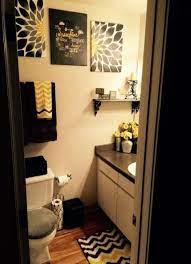 I'm more of a fan of the muted yellows, but any shade of gray. Apartment Bathroom Ideas Yellow Grey 58 Ideas Black Bathroom Decor Yellow Bathroom Decor Restroom Decor