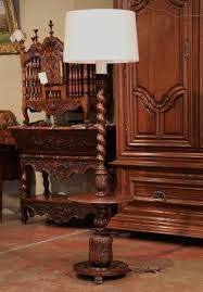 Each floor lamps is different we start with a natural cedar log with a crotch to allow the table to be attached, we use los from 4 up to 16 for the massive natural look, table size will vary so give us a call with your needs, most are cut to. Early 20th Century French Carved And Barley Twist Floor Lamp With Attached Table At 1stdibs