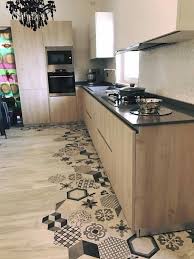 If you have a beautiful spacious kitchen with a lot of asian accent, here is a flooring idea that will perfectly suit your kitchen interior. 19 Flooring Transitions From Wood To Tile Fancydecors In 2020 Kitchen Flooring Floor Design Home Remodeling