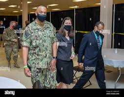 U.S. Navy Cmdr. Greg Leveque, the officer in charge of the state-run,  federally-supported COVID-19 Community Vaccination Center in Norfolk,  Virginia, and U.S. Rep. Elaine Luria (D-Va.) tour the site prior to a