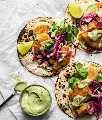 Check spelling or type a new query. Crispy Fish Tacos With Tahini Avocado Crema And Red Cabbage Slaw Soom Foods Red Cabbage Slaw Crispy Fish Tacos Fish Tacos