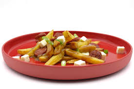 From canadian french (quebec french), ultimate origin unclear. Poutine Popfood
