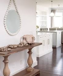Beautifully handcrafted, quality solid wood mirrors up to 33% off! Round White Ball Mirror With Balustrade Console Table Transitional Living Room