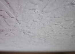 Our Specific Variety Of Textured Ceiling Has A Few Names Crows Feet Stomp Texture Slap Brush And Pa Ceiling Texture Remove Textured Ceiling Stomped Ceiling