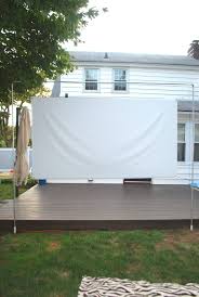 Blackout cloth has a smooth and foam backed side. Diy Outdoor Movie Screen And Stand Showit Blog