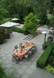 They look like they belong there. 10 Paver Patios That Add Dimension And Flair To The Yard