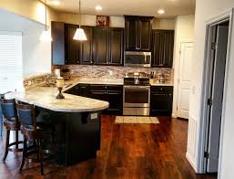Ryan Homes Florence Espresso Cabinet S Luxury Vinyl Tile Tan Back Splash Stainless Steal Hardware Vinyl Flooring Ryan Homes Vinyl Flooring Bathroom