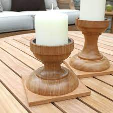This would also make a great pedestal for a small houseplant or other decorative object. Teak Wood Candle Holders Lumina Small Candle Holder