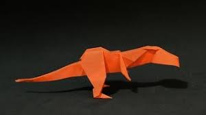 Take 2 pieces and cut slits in the top on opposite sides. Origami Dinosaur T Rex Youtube