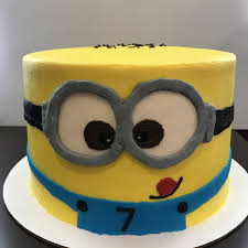 The cylindrical, yellow, small alien looking creatures' popularity reached a whole new level of popularity following the release of the film. Minion Cake Decorated With Buttercream Absolutesweetsllc Buttercream Birthday Cake Minion Cake Buttercream Minion Birthday Cake Buttercream