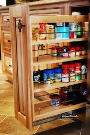 A Base Cabinet Pull Out Spice Rack Keeps Cooking Items Handy Next To The Range Pull Out Spice Rack Kitchen Design Base Cabinets