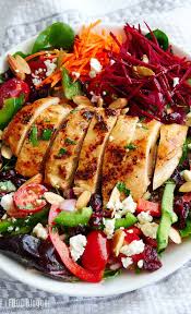 Grilled Chicken Salad Loaded With A Variety Of Healthy Greens And Vegetables And Top Grilled Chicken Salad Recipe Chicken Salad Recipes Grilled Chicken Salad