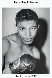 Who am I ? I was a two champion in my division and fought the top  contenders, however Boxing was just one of the professions I was good at. I  was also