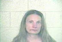 Woman charged with trying to kill brother