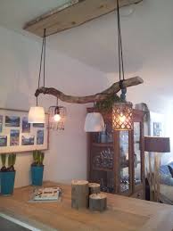 lamp lang leve de storm met een tak die we hebben gevonden na een storm hebben we deze takkenlamp eettafel verlichting lampen eettafel landelijke interieurs
