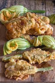 The whole process is simple, takes little work, and the results are great. Italian Stuffed Zucchini Flowers Mozzarella Prosciutto The Best Recipe