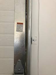 The safety sensors on either side of the garage door near the floor could be blocked from the view of each other or their alignment is a bit off or one of its wires is damaged. Garage Door Flashing Sealing Greenbuildingadvisor