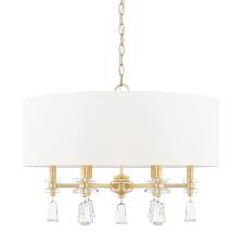 Drum pendant lantern chandelier has polished brass finish, that keeps fixture smooth and solid. Milan White Shade Brass Crystal Chandelier