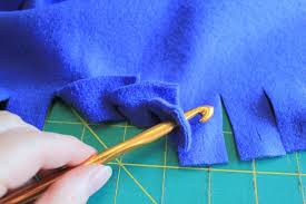 An easy to make fleece baby blanket that requires no sewing. How To Make A No Sew Blanket To Keep Warm This Winter