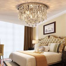 (a good rule of thumb is to hang a light 28 to 32 inches above a dining table, but it can be higher or lower, depending on your preference, the size of the chandelier and your ceiling height.) 3. Contemporary Round Crystal Chandelier Flush Mount Ceiling Lights Sofary