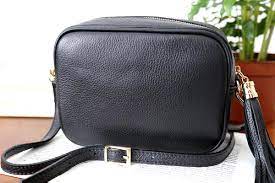 Maybe you would like to learn more about one of these? Petit Sac En Cuir Noir Aly Avec Bandouliere Retour Offert Saheline