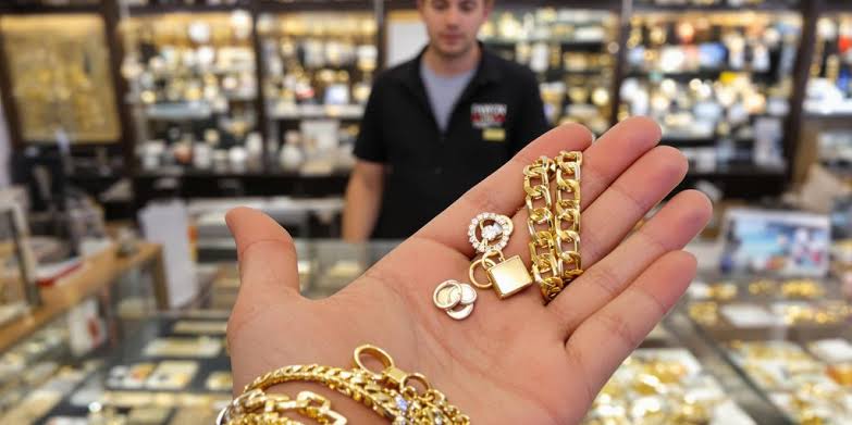 Are pawn shops a good option for selling gold jewelry?