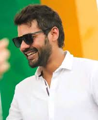 Any guesses who this is in the pram ?