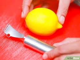 It's removing the very outer layer of skin from a citrus fruit. 4 Ways To Zest A Lemon Wikihow
