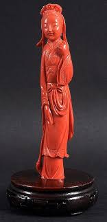 Red coral statue carved figure guanyin lady. Description A Fine Early 20th Century Chinese Carved Red Coral Figure Of A Female Modelled In Flowing Robes With One Coral Art Coral Coral Sculpture