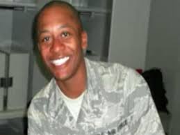 Body of slain airman returned to grieving Wilson community