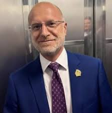 FCC chairman Brendan Carr sporting his trump head lapel pin. No required of  cabinet people. What's the sale price?