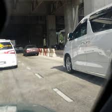 What is the process for checking in at the airport? Lebuhraya Bukit Jalil To Puchong