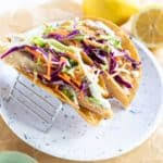 Heat 1 tablespoon of vegetable oil in a cast iron skillet over medium high heat. Best Easy Fish Tacos Slaw Binge Worthy Bites